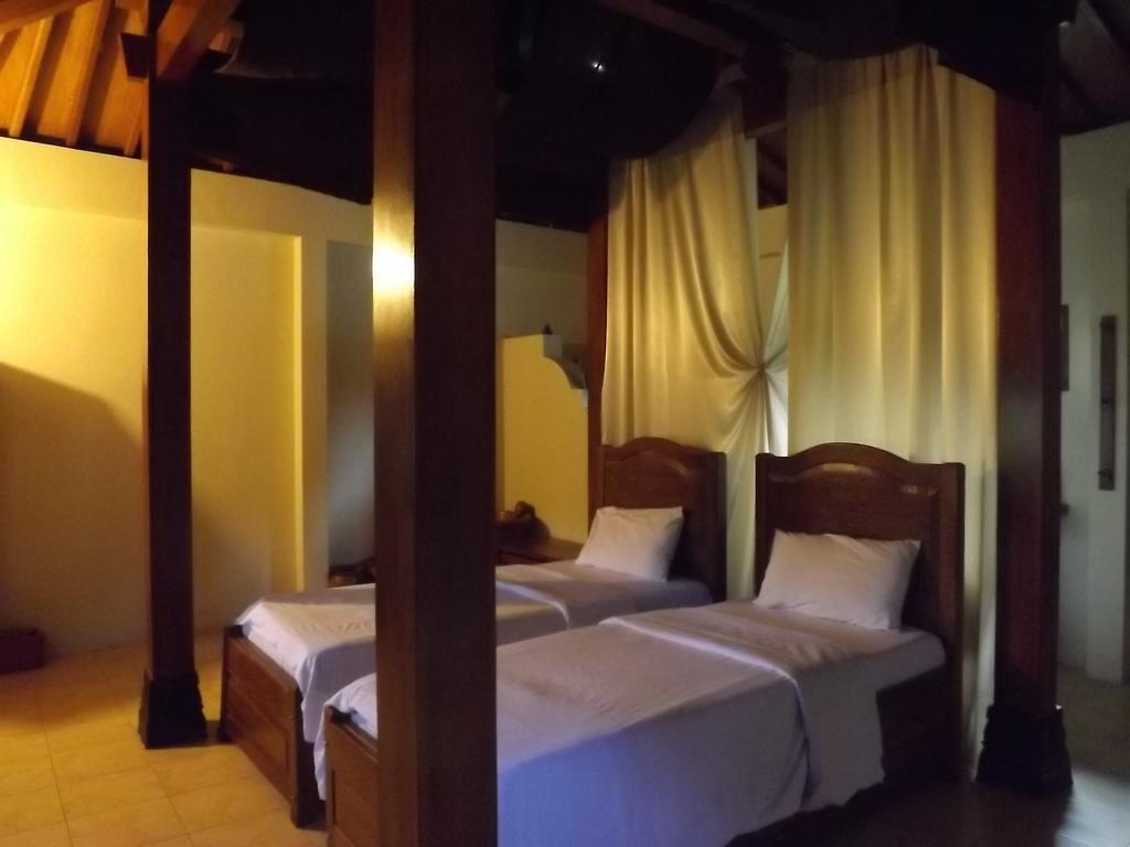 Rumah Dharma Магеланг Номер фото